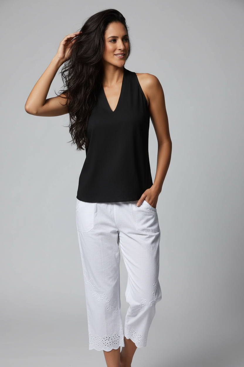 White Capri pants by Cotton Natural featuring a comfortable fit and classic design, perfect for casual or summer wear.