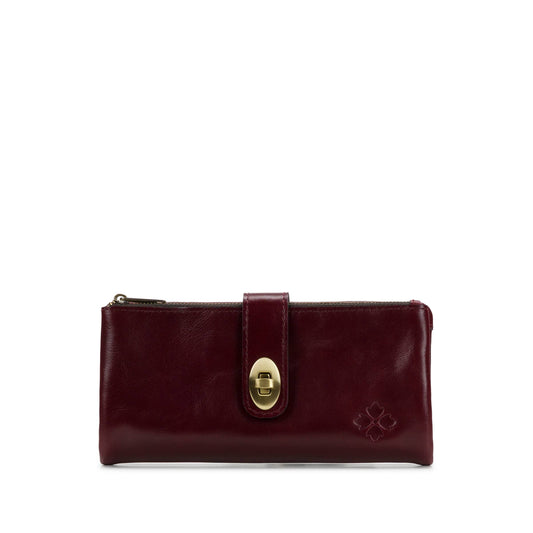 Patricia Nash Annesley vintage distressed leather wristlet with gold-tone hardware and a compact, stylish design.