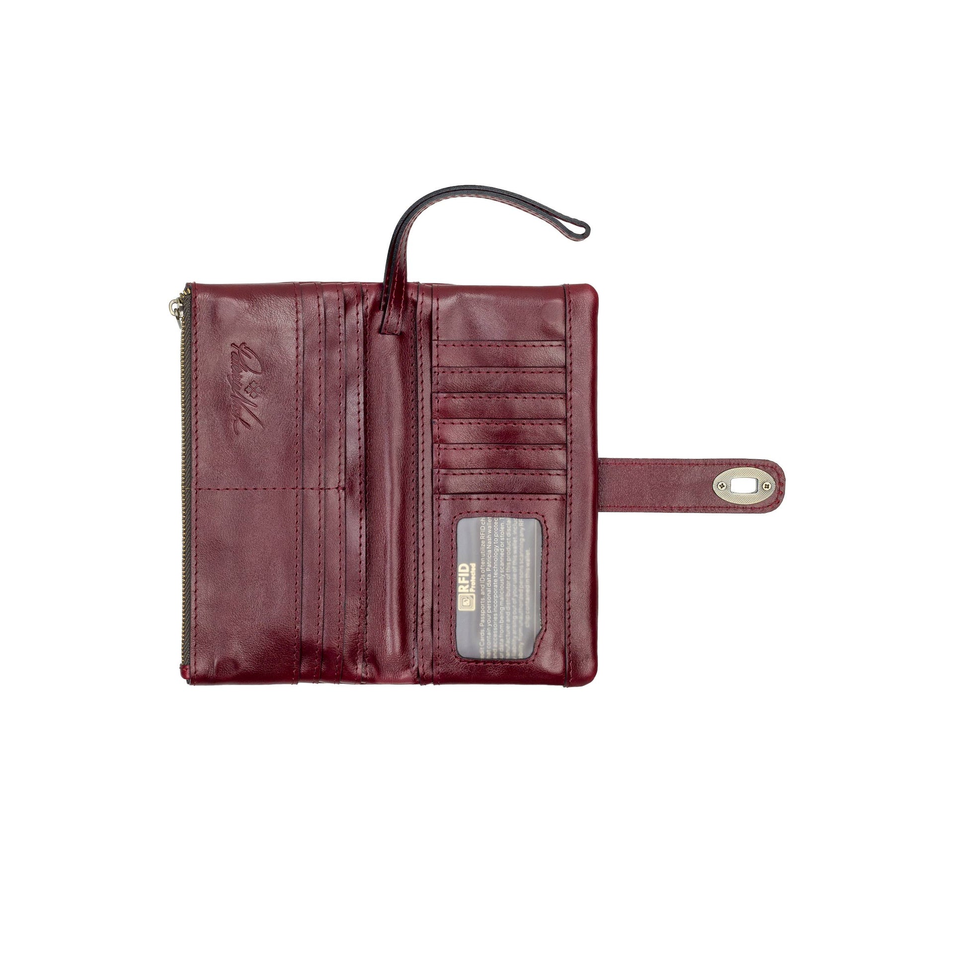 Patricia Nash Annesley wristlet in vintage distressed leather with compact design and wrist strap, stylish and functional.