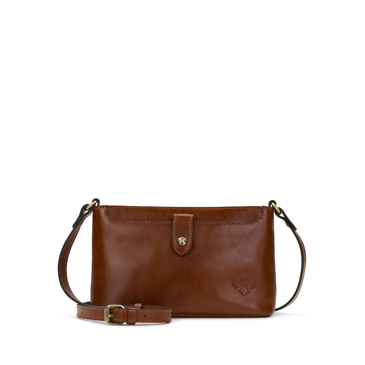 Black Patricia Nash Aimee Crossbody bag with adjustable strap and detailed stitching, made of durable leather.