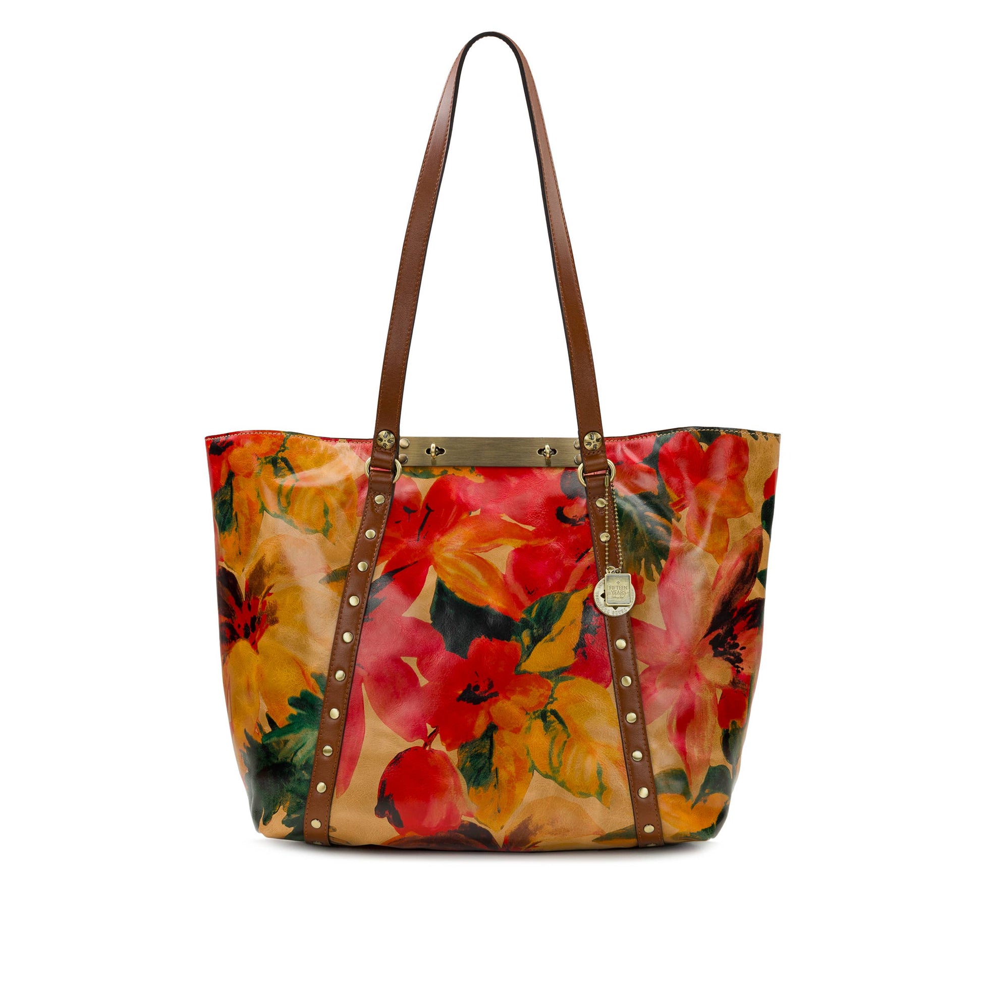 Patricia Nash Benvenuto Tote in Aegean Blooms with floral pattern, leather accents, and spacious interior for everyday use.