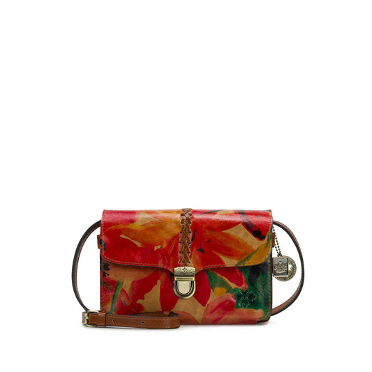 Patricia Nash Bianco Crossbody bag in spring multi with floral design and leather strap, showcasing its detailed craftsmanship.