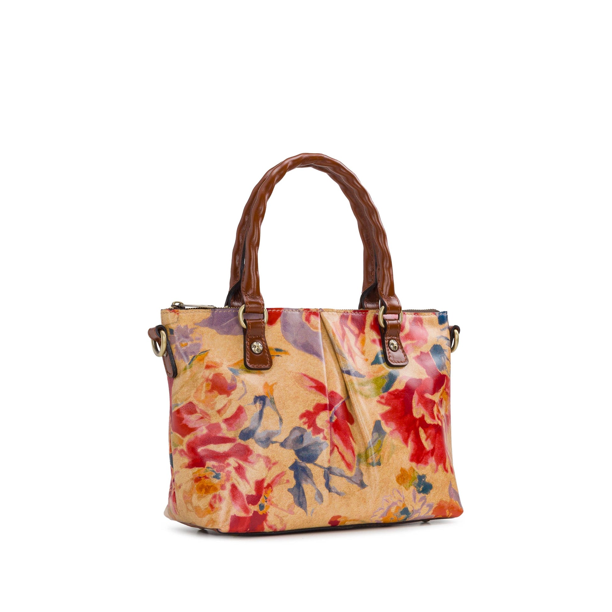 Patricia Nash Zora top handle crossbody bag with Aegean Blooms floral pattern and brown leather accents.