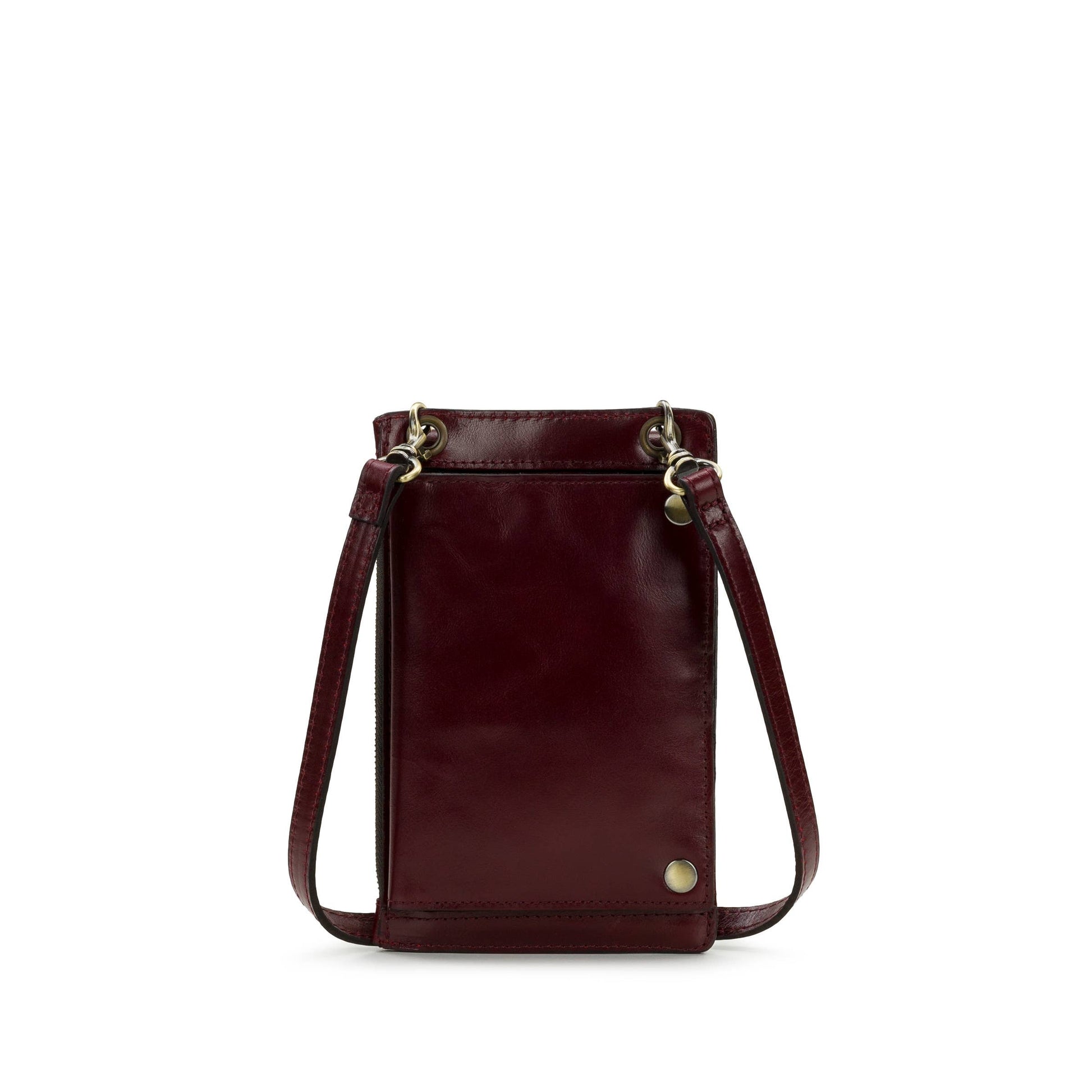 Patricia Nash Chiavella phone crossbody bag with leather strap and detailed stitching, designed for carrying essentials stylishly.