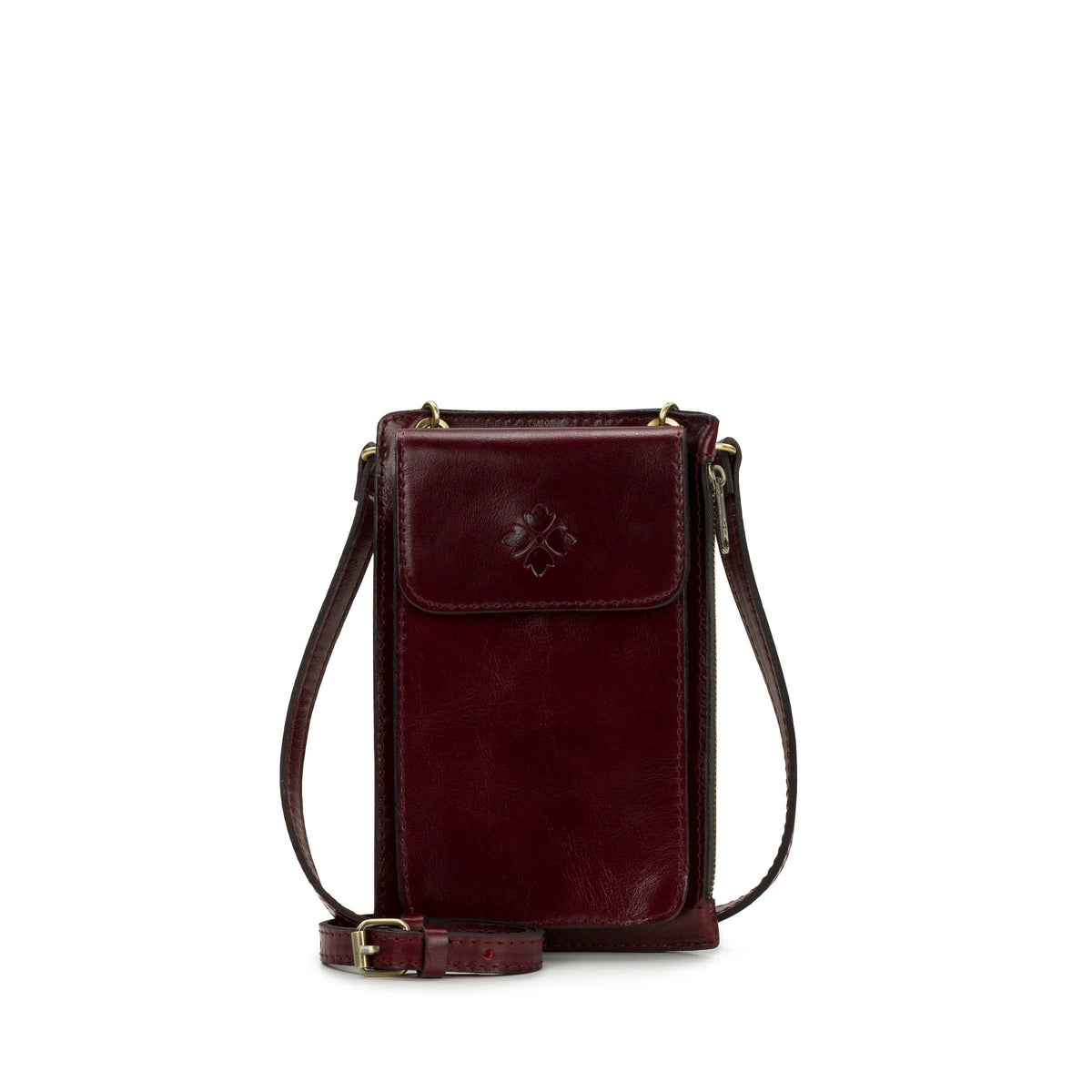 Patricia Nash Chiavella phone crossbody bag with leather strap and embossed logo, featuring a compact design and elegant style.