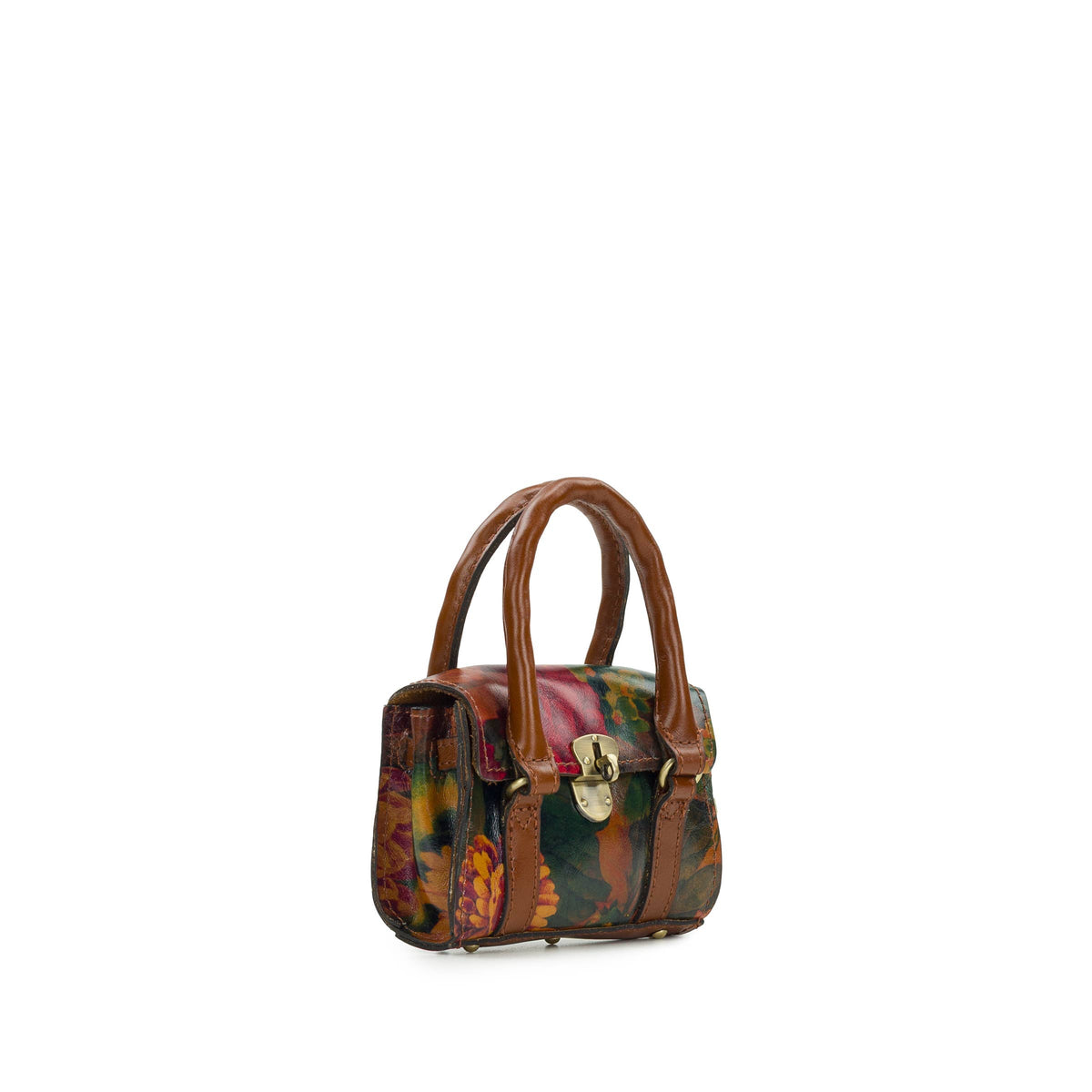 Patricia Nash Mini Vienna Bag Charm featuring a decorative metal and leather design with intricate details.