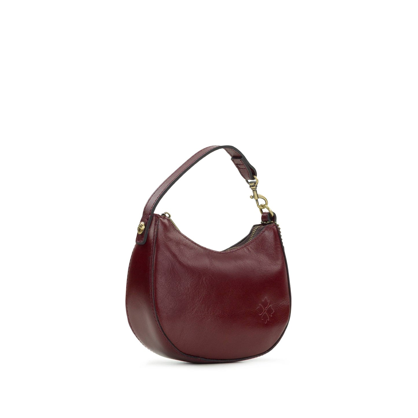 Patricia Nash Mini Morgana Bag Charm featuring intricate leather design and metal accents, attached to a keyring.