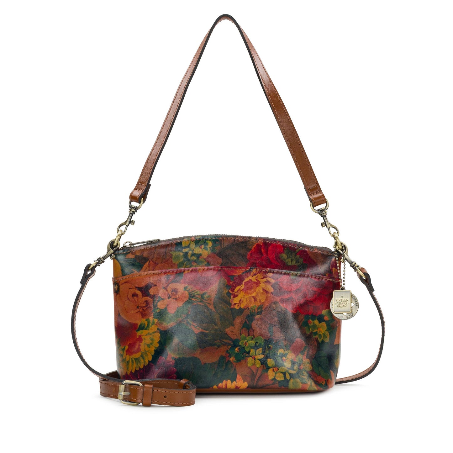 Patricia Nash Arlee Crossbody bag with leather strap and embossed design, showcasing vintage-inspired craftsmanship and compact style.
