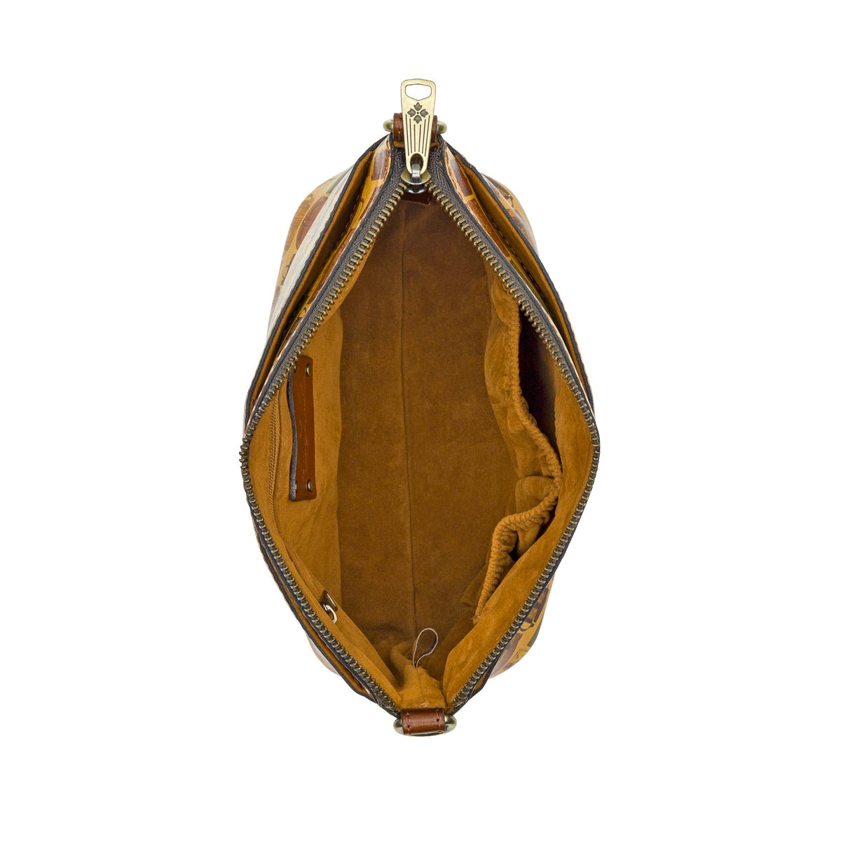 Patricia Nash Arlee Crossbody bag in tan leather with adjustable strap and embossed logo, featuring antique brass hardware.