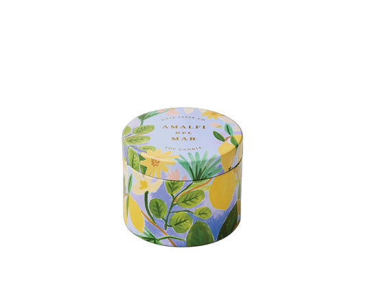 Rifle Paper Company Amalfi del Mar 3 oz tin candle with colorful floral design and white wax interior.