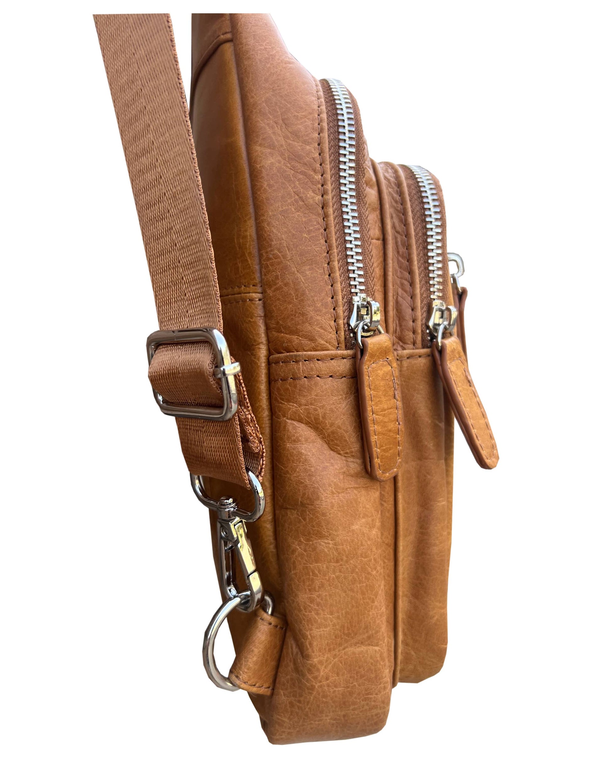 Roma Leathers cowhide leather sling bag with adjustable shoulder strap, featuring a sleek, natural-texture design.