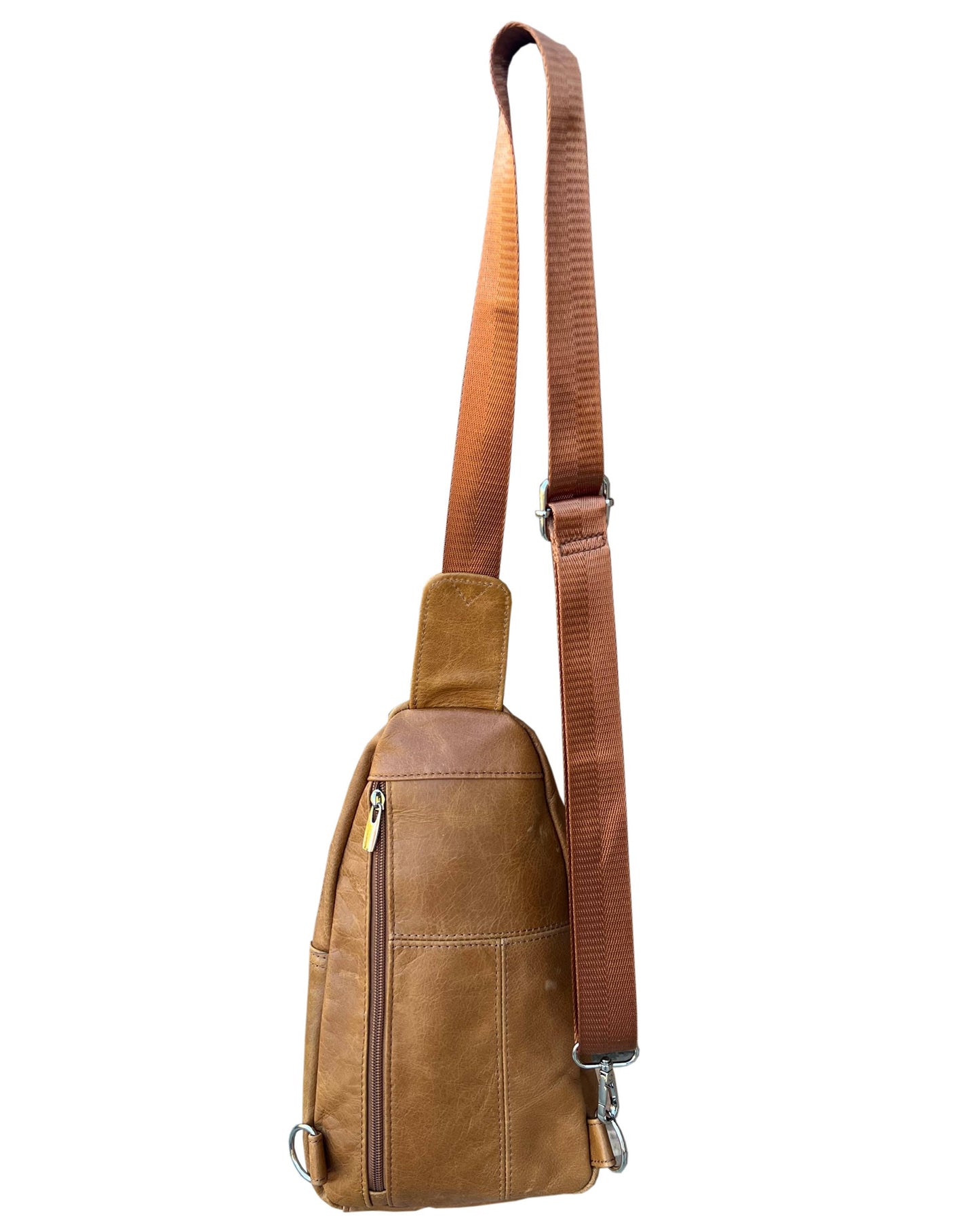 Cowhide leather sling bag with adjustable shoulder strap by Roma Leathers, Inc. showing the bag’s texture and strap details.