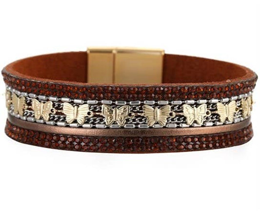 Brown leather strap bracelet with gold butterfly charm from S & A Fashions, featuring a stylish and elegant jewelry design.