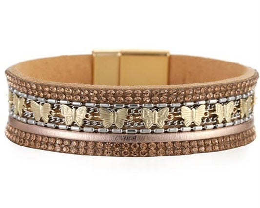 Tan leather strap and gold butterfly bracelet by S & A Fashions, featuring a delicate gold butterfly charm on a tan leather band.