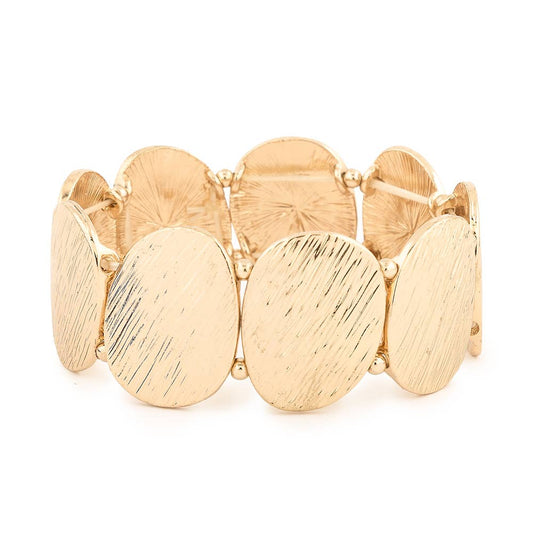 Gold textured oval stretch bracelet from S & A Fashions featuring shiny, interconnected oval links on a flexible band.