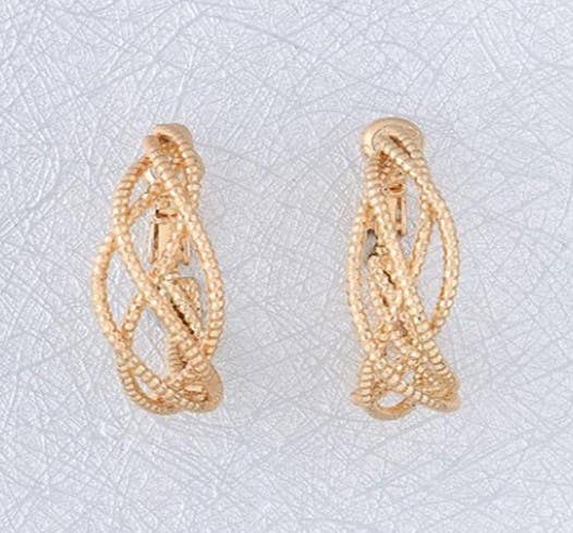 Gold twisted hoop earrings from S & A Fashions, showcasing their unique spiral design and shiny finish.