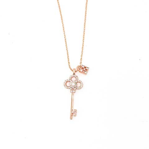 Rose gold crystal key and lock necklace from S&A Fashions, featuring a delicate chain and sparkling crystal accents.