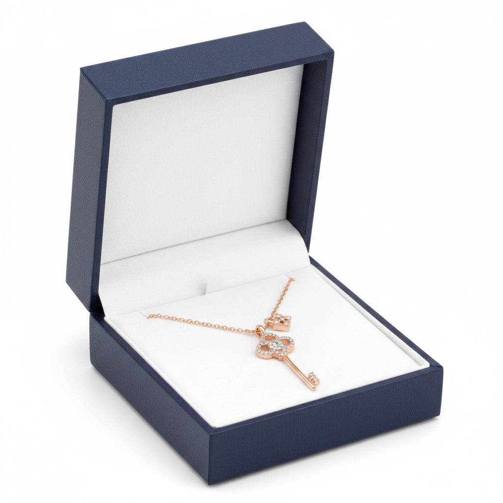 Silver crystal key and lock necklace by S&A Fashions featuring a detailed pendant with sparkling crystal accents.