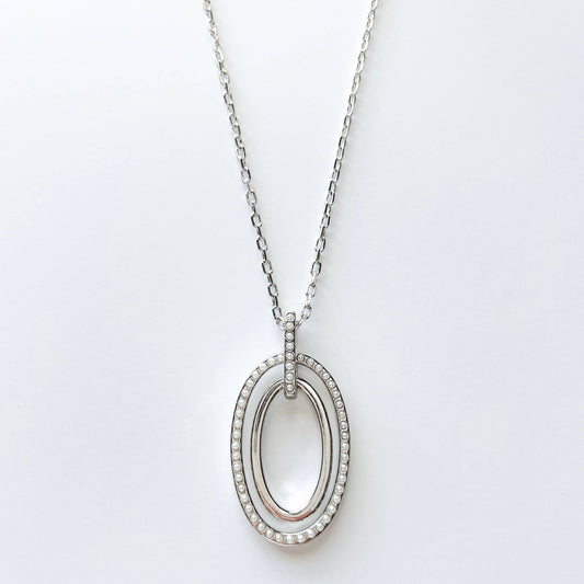 S & A Fashions double oval pendant necklace with mini faux pearls, featuring a stylish and elegant jewelry design.