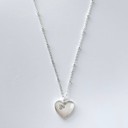 S & A Fashions heart-shaped stone pendant necklace with a delicate chain, perfect for stylish jewelry accessories.