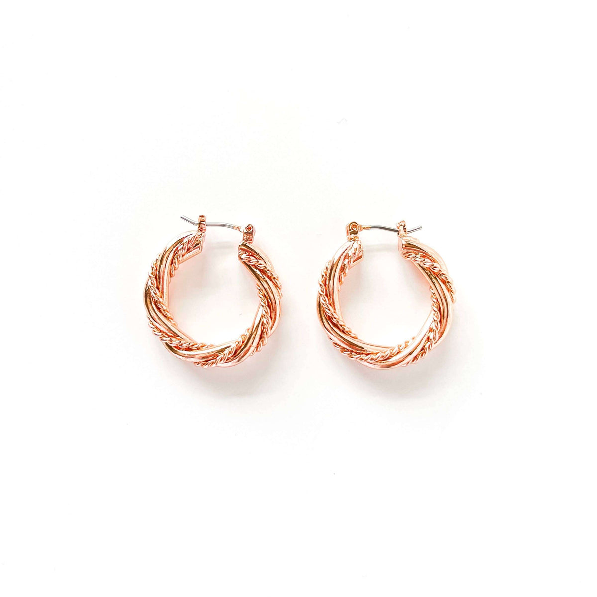 S&A Fashions twisted solid and rope hoop earrings, stylish jewelry with intricate design, showcasing their unique twisted and rope textures.