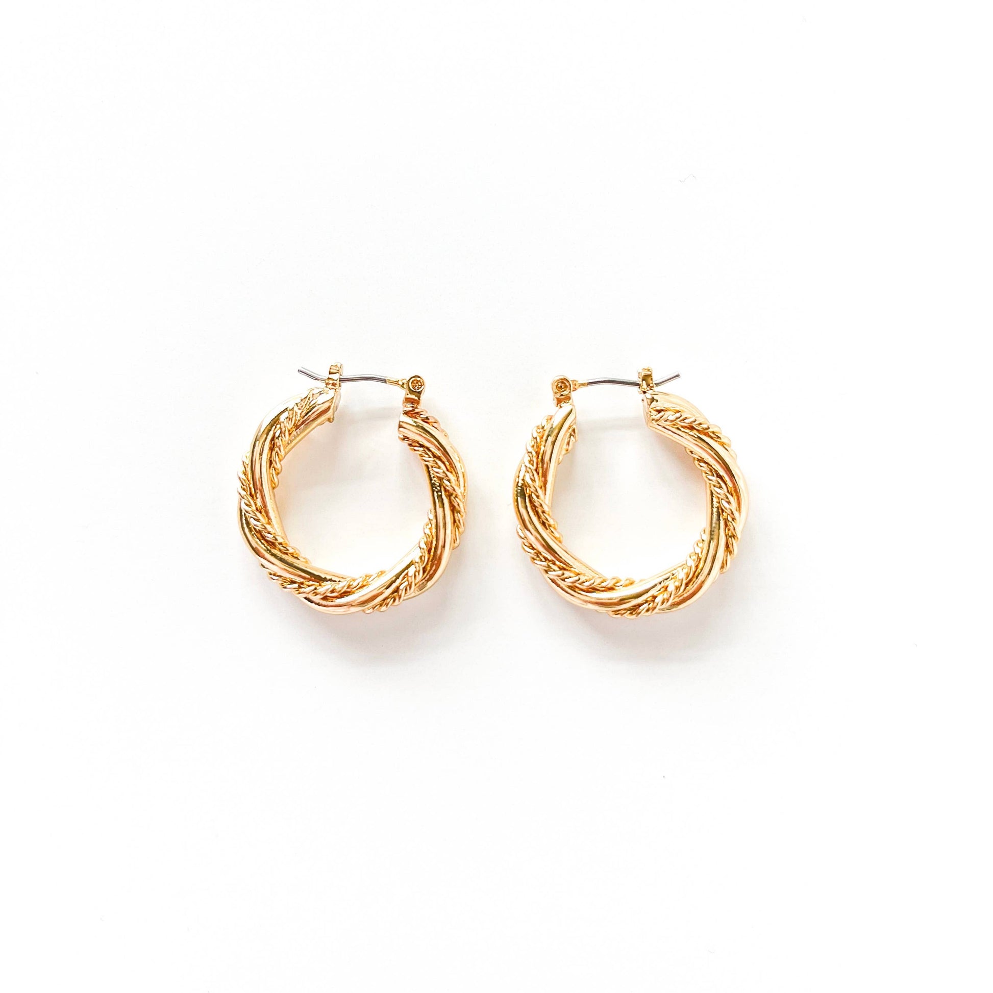 S&A Fashions twisted solid and rope hoop earrings in gold, featuring a stylish intertwined design for a bold jewelry look