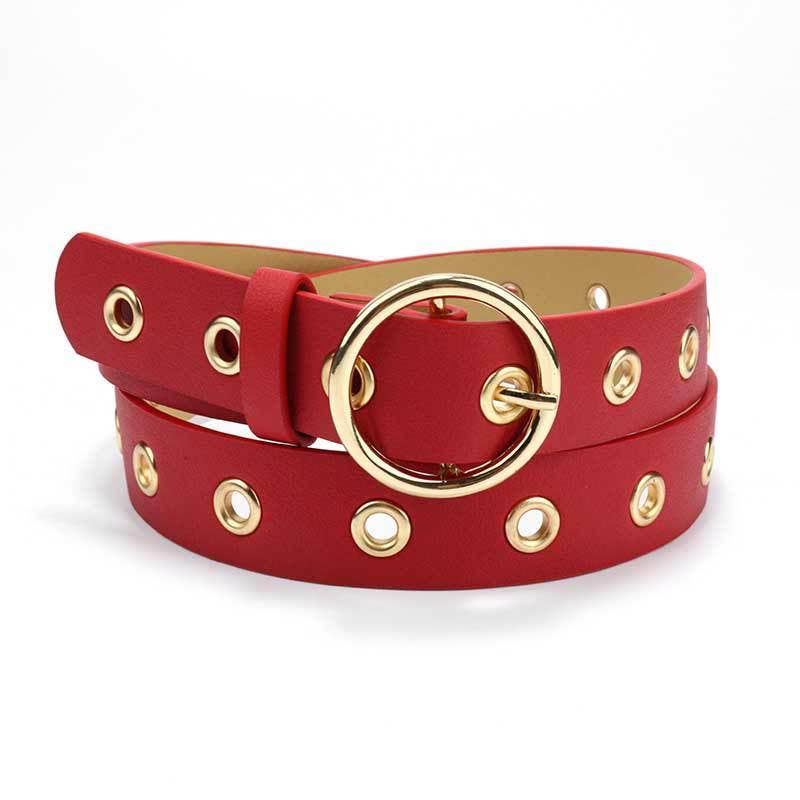 Leather belt with round buckle from SALINA TRADING INC, featuring a classic design and adjustable fit.