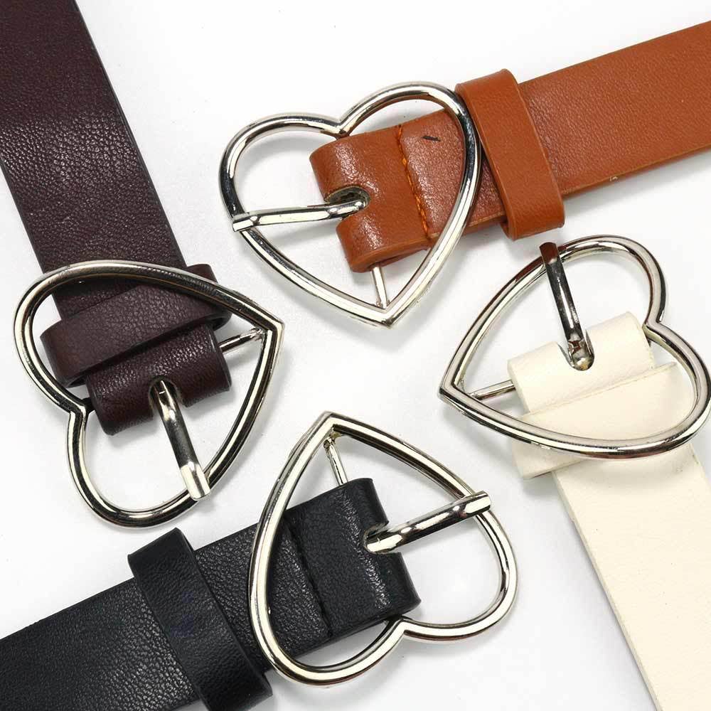 Heart-shaped belt from SALINA TRADING INC featuring a stylish design and adjustable strap, perfect for fashion accessories.