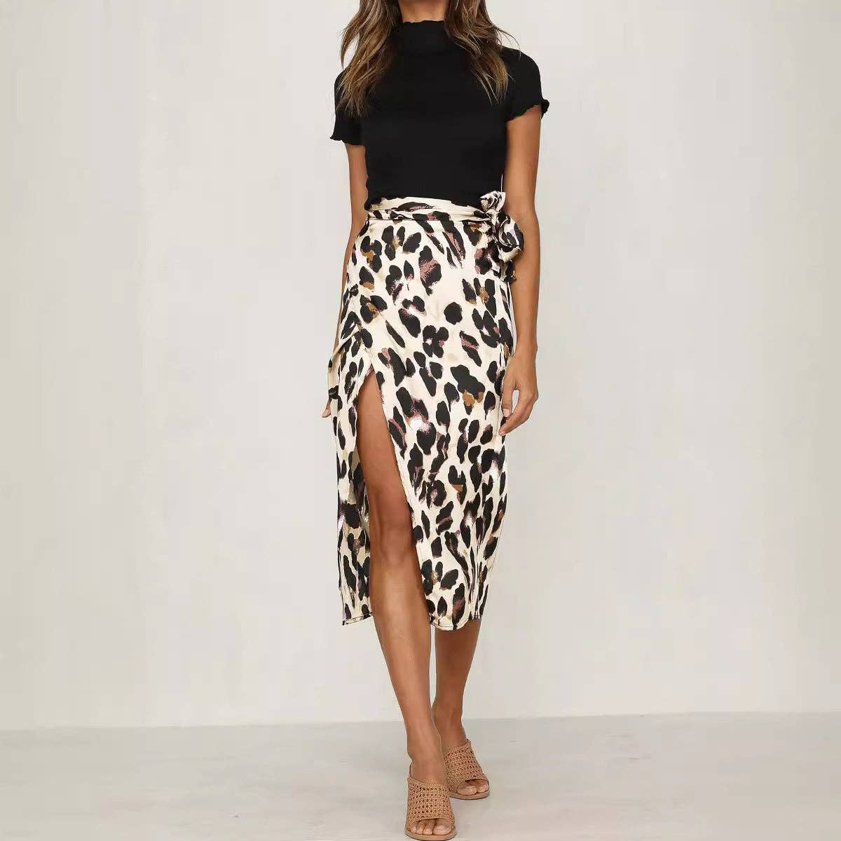 Leopard print skirt by SALINA TRADING INC featuring a stylish, flowy design with a bold animal pattern.