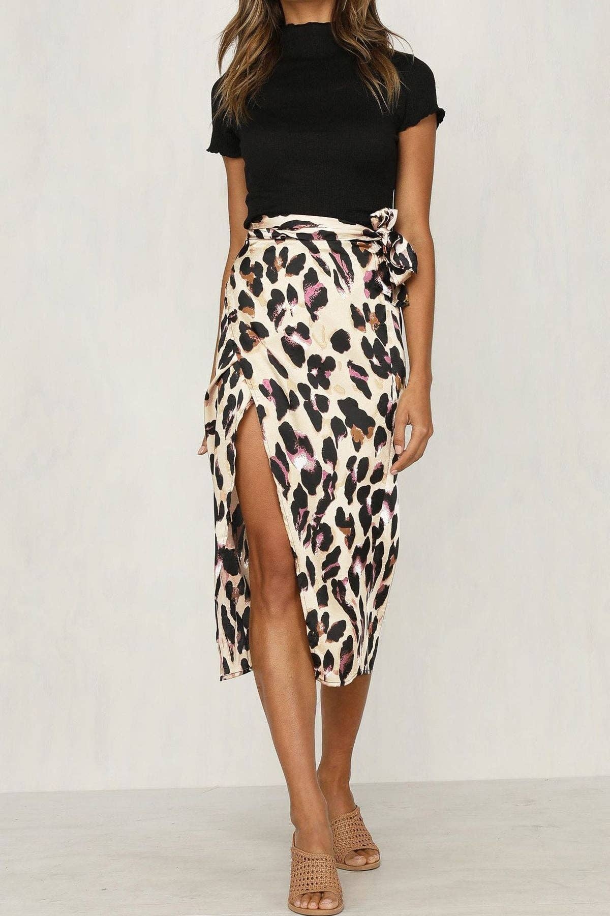 Leopard print skirt from SALINA TRADING INC featuring a stylish, flowy design perfect for casual or trendy outfits.