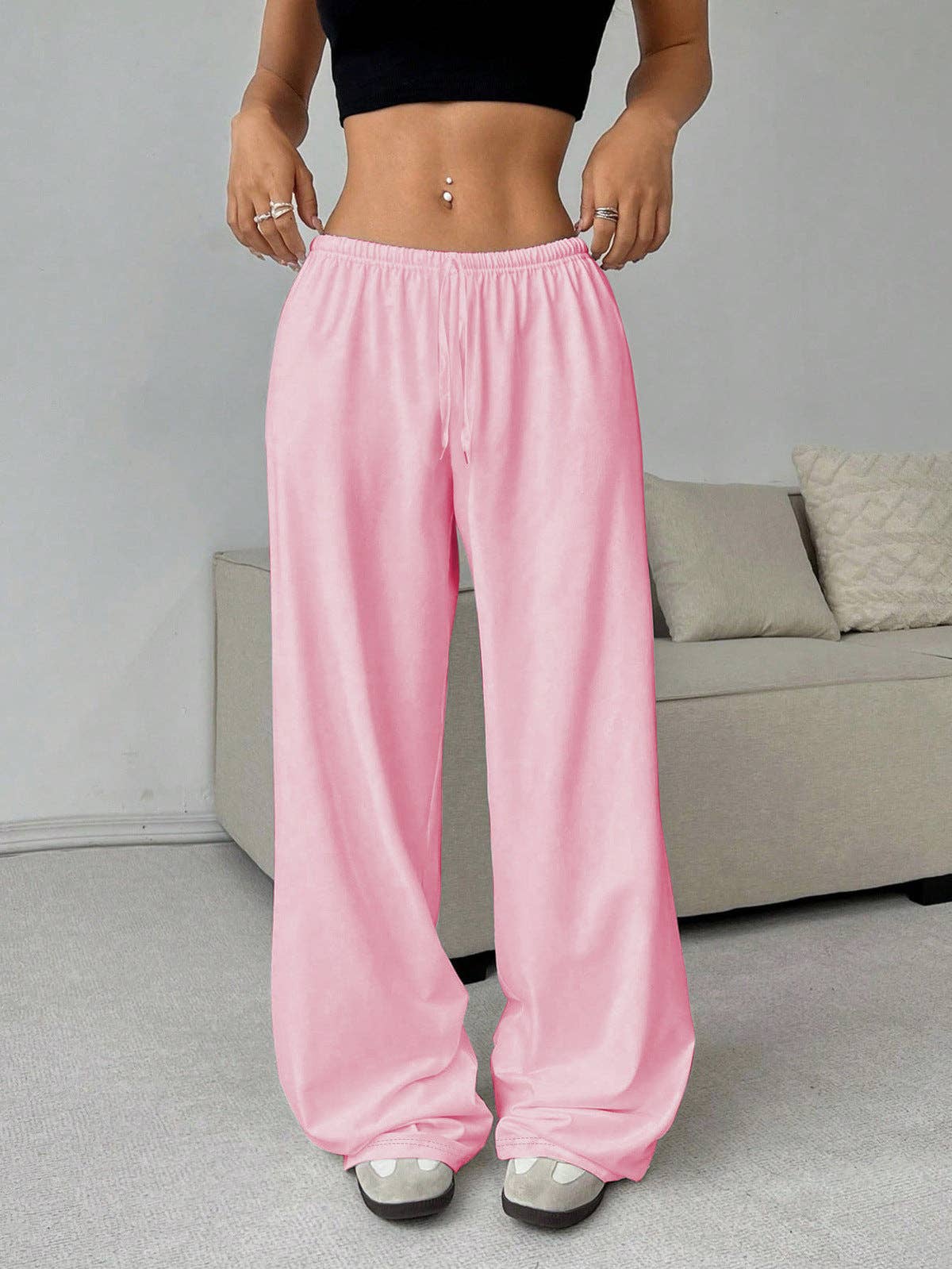Loose wide leg pants by SALINA TRADING INC, featuring relaxed fit and flowing fabric, shown in a neutral color.