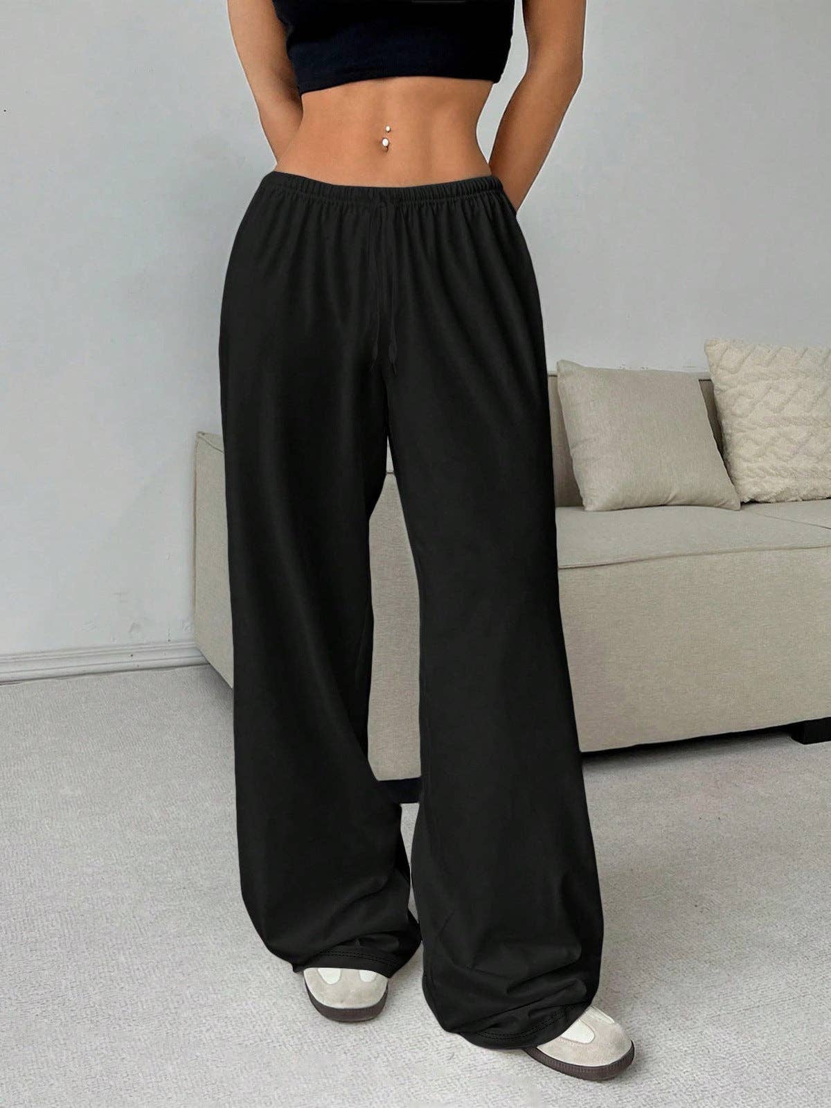 Loose wide-leg pants from SALINA TRADING INC, featuring a relaxed fit and lightweight fabric, shown in a neutral color.