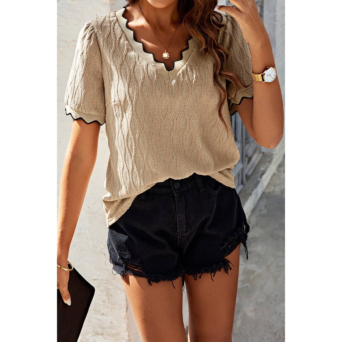 Light beige knit loose fit V-neck drop shoulder top by Supreme Fashion, showcasing its relaxed style and soft fabric.