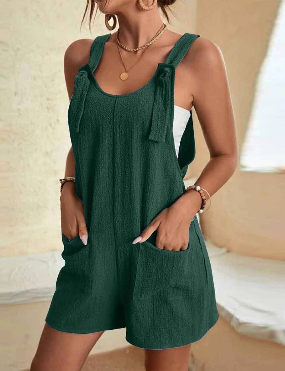 Sweetkama solid color romper and pocket jumpsuit displayed on a model, featuring a sleeveless design and casual fit.