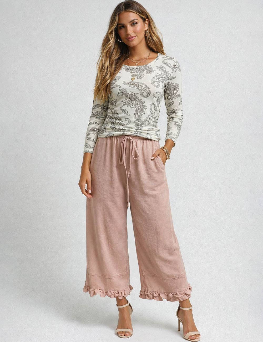 Sweetkama ladies wide leg pants with elastic waist, drawstring, and ruffle hem, featuring a stylish and comfortable design.