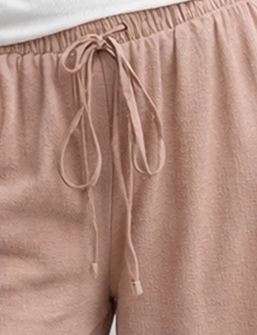 Sweetkama women's elastic waist drawstring wide-leg pants with ruffle hem, featuring a comfortable fit and stylish flowy design.