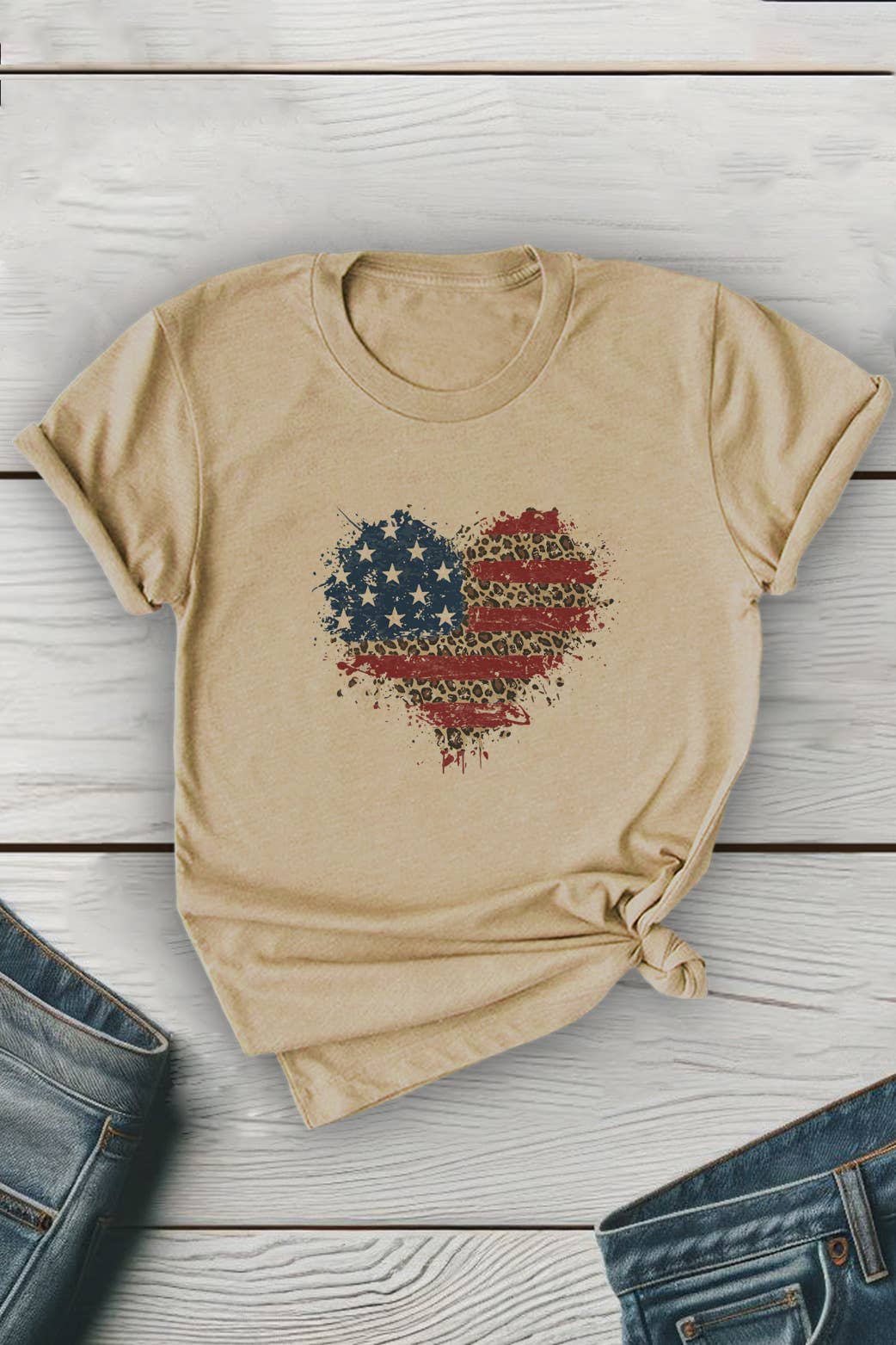 Unisex round neck T-shirt featuring a American flag heart splatter design in vibrant red, white, and blue graphics.