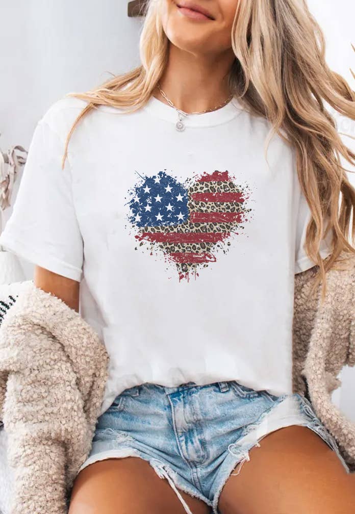Unisex round neck T-shirt with American flag heart splatter design by Top Avenue, featuring patriotic red, white, and blue colors.