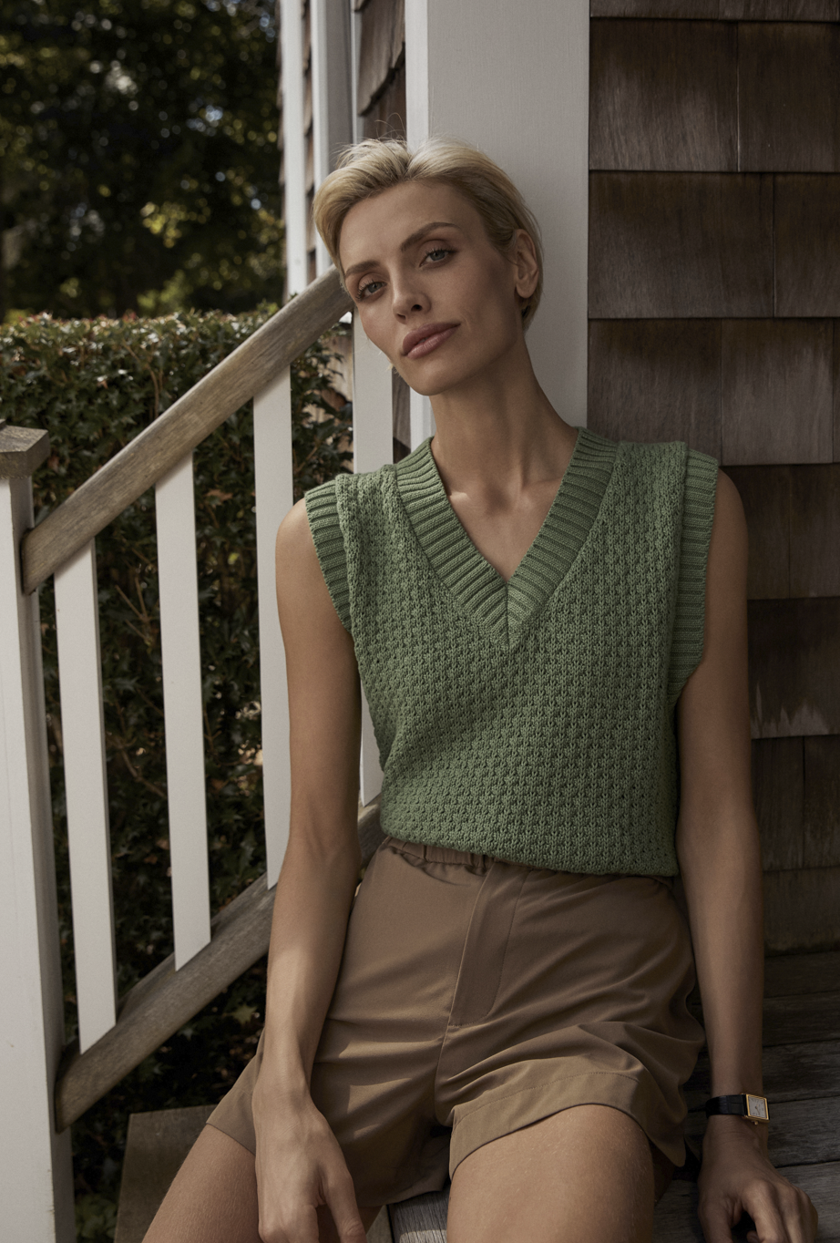 Varley Antonella knit vest in neutral tones, featuring a fitted design with ribbed accents and a stylish, versatile look.