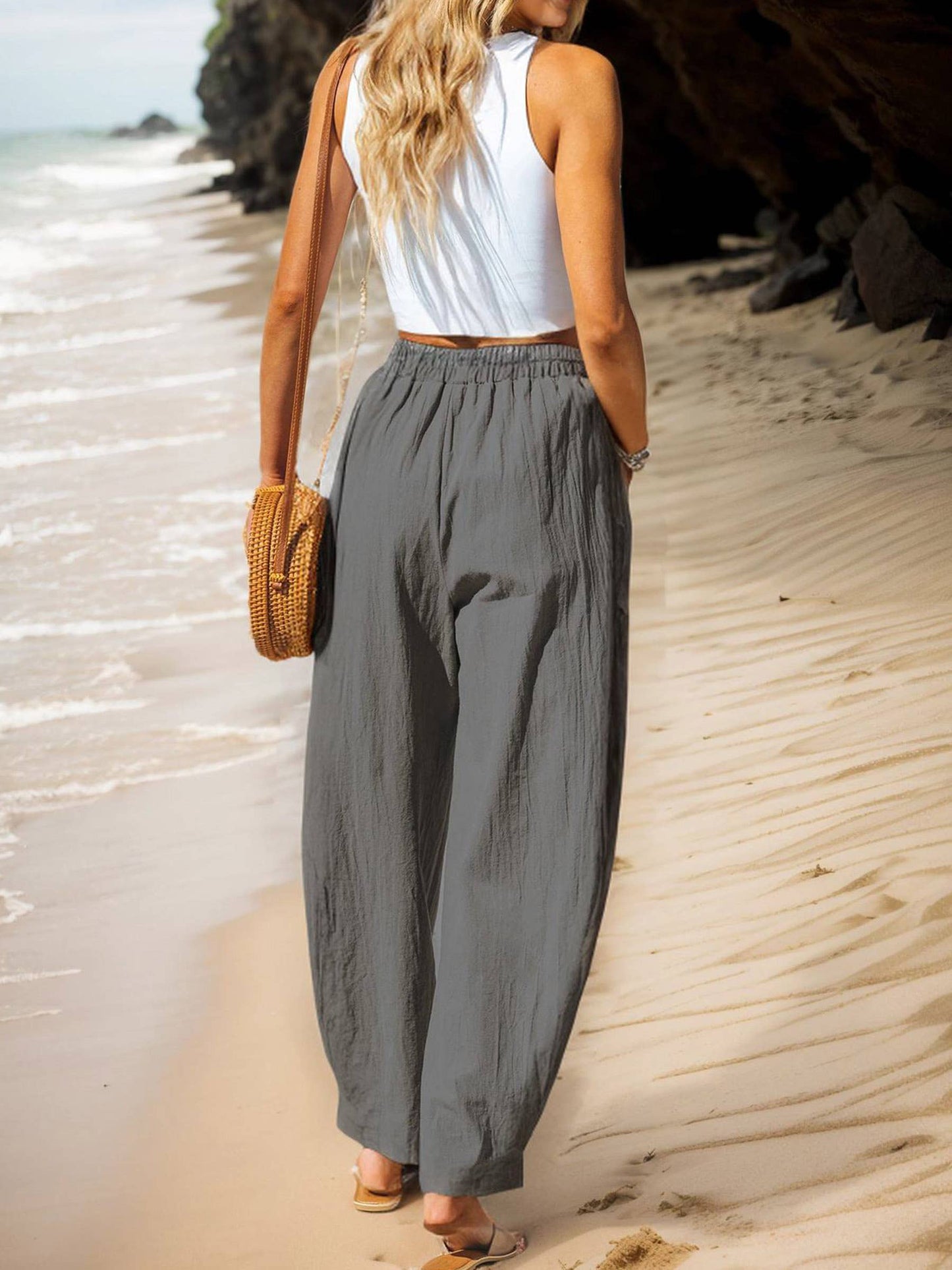 Gray solid casual cargo pants by Wholesalesir, featuring multiple pockets and a relaxed fit, suitable for everyday wear.