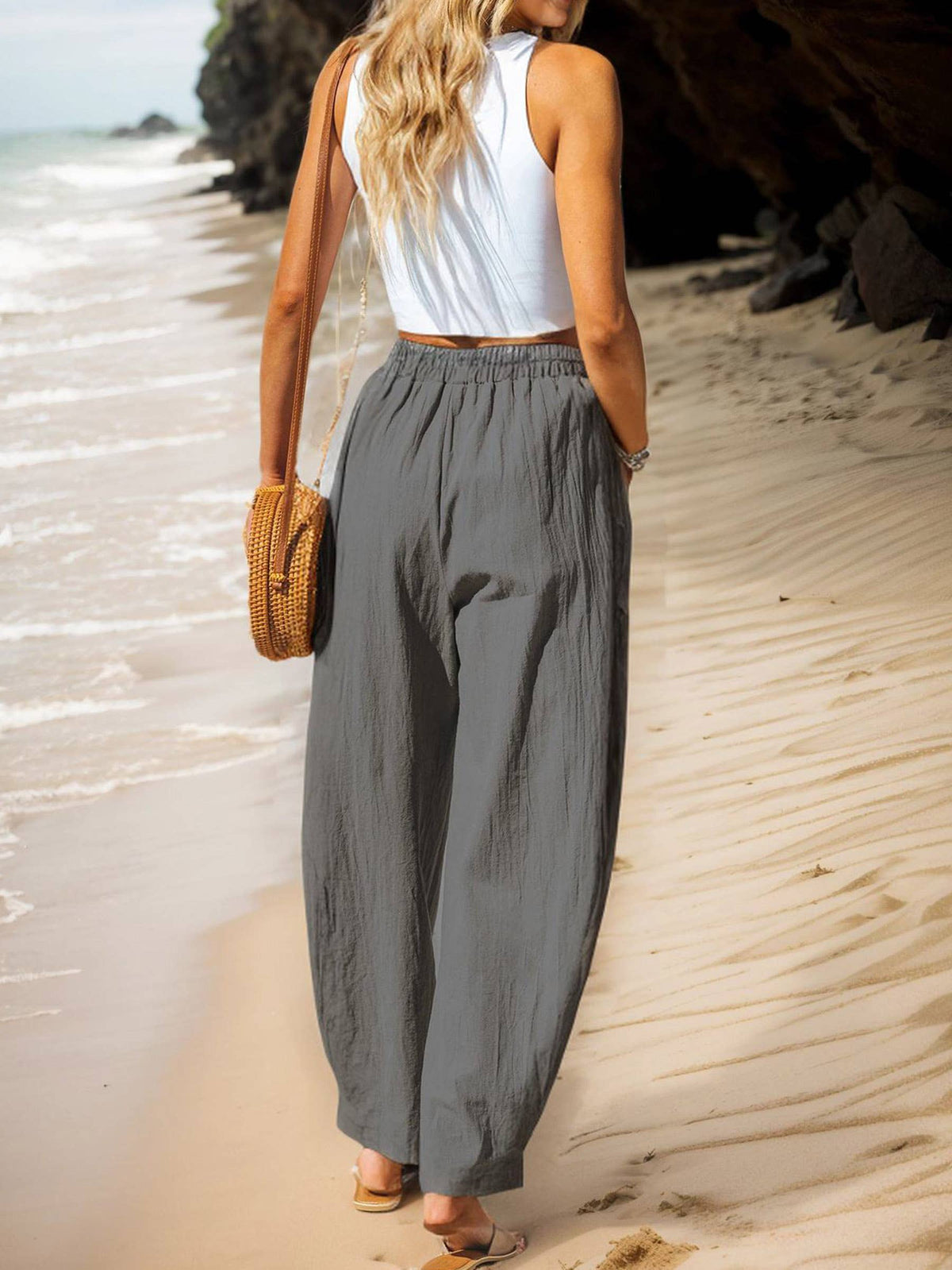 Gray solid casual cargo pants by Wholesalesir, featuring multiple pockets and a relaxed fit, suitable for everyday wear.